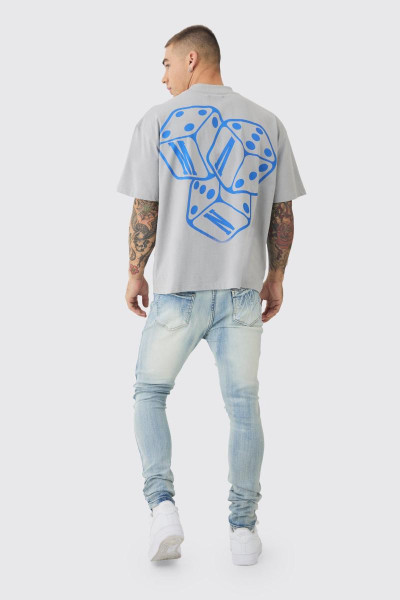 Супервузькі стрейч-блідо-блакитні байкерські джинси з рваними і відновленими накладками