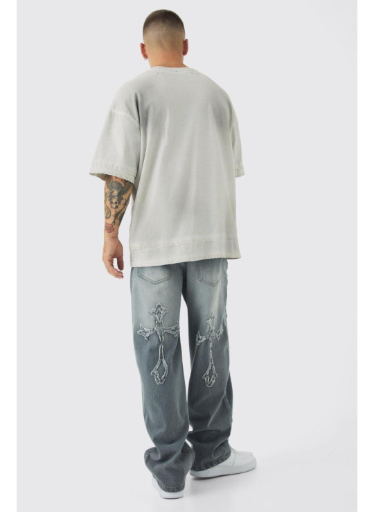 Мішкуваті світло-сірі джинси з жорсткою хрестовою аплікацією