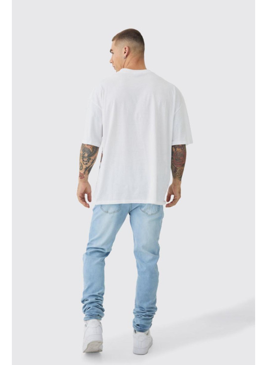 Вузькі стрейч-рвані джинси в купу