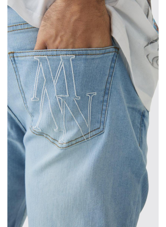 Вузькі стрейч-рвані джинси в купу