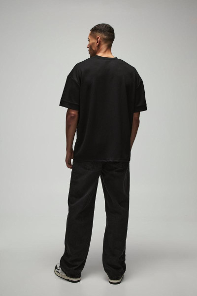 Мішкуваті жорсткі джинси чорного кольору