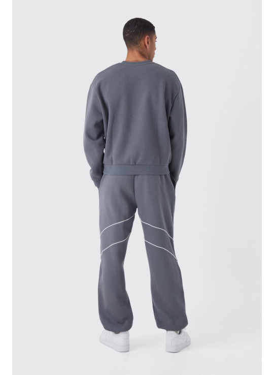 Негабаритний комодський колегний костюм