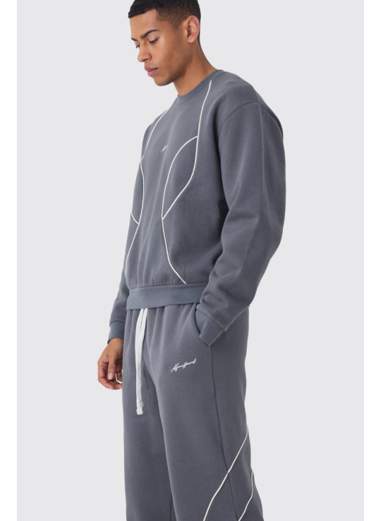 Негабаритний комодський колегний костюм