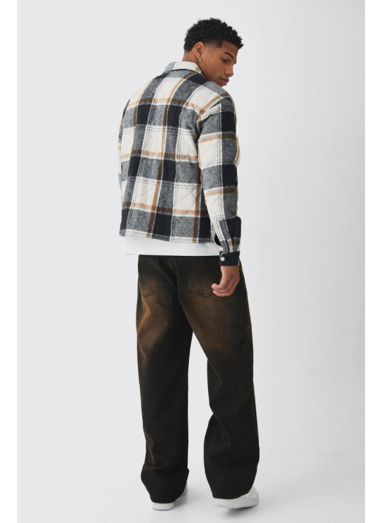 Розслаблені жорсткі коричневі витерті джинси