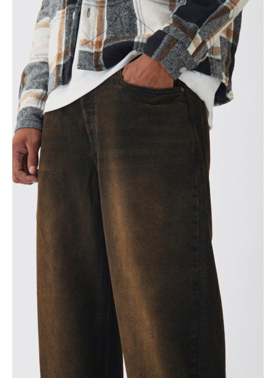 Розслаблені жорсткі коричневі витерті джинси