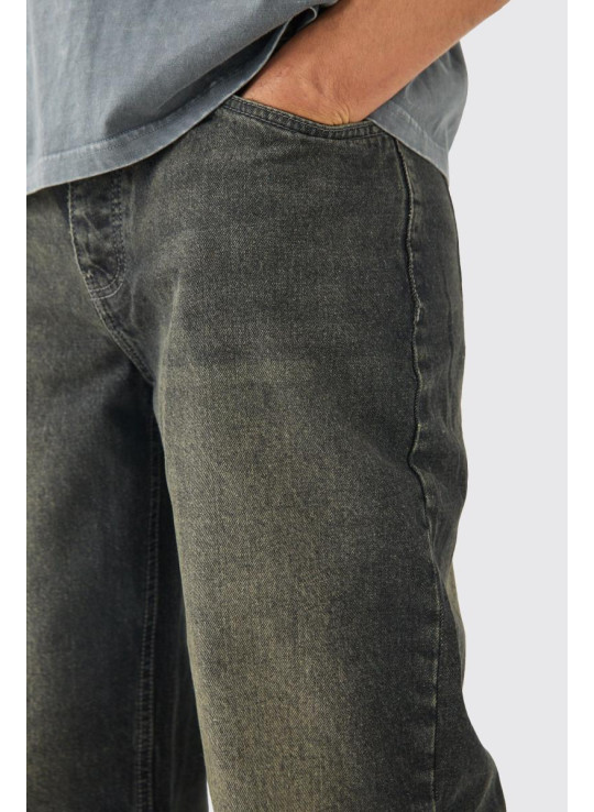 Мішкуваті сірі жорсткі джинси зі спущеним краєм