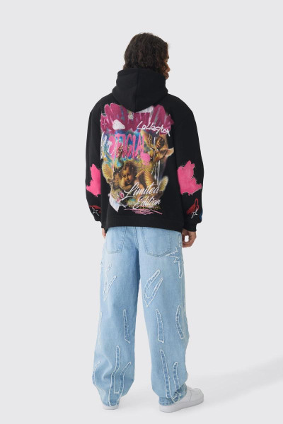 Мішкуваті жорсткі джинси з необробленими краями з аплікацією