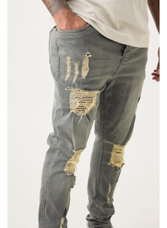 Плюс супервузькі стрейч-джинси з кількома порізами