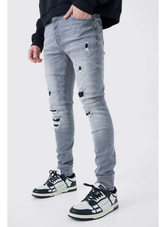 Вузькі стрейч-рвані джинси сірого льоду