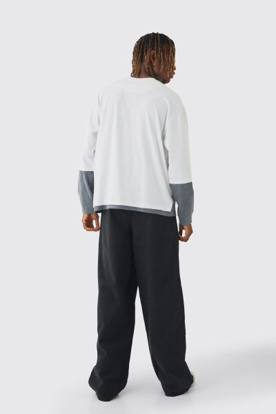 Високі мішкуваті штани з еластичною талією і контрастним шнурком