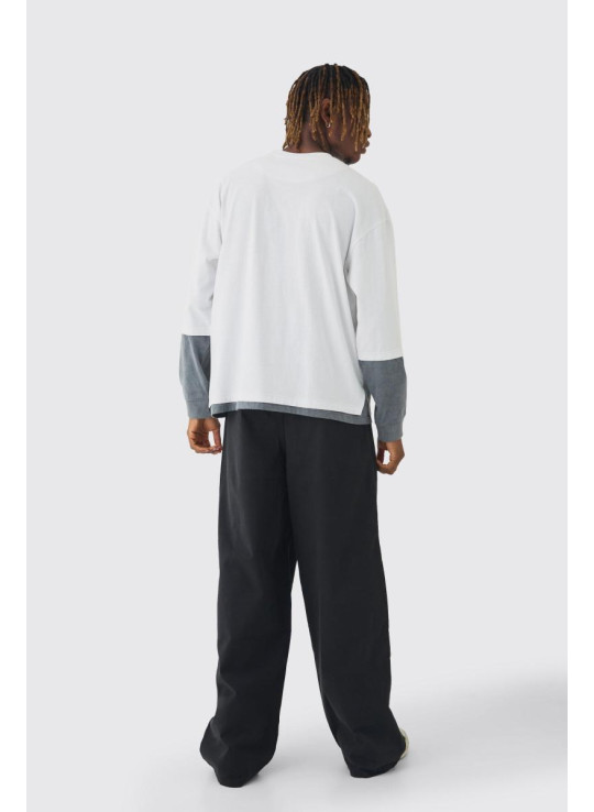 Високі мішкуваті штани з еластичною талією і контрастним шнурком