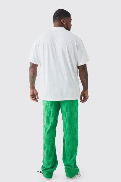 Висока футболка та штани з тисненням у клітинку