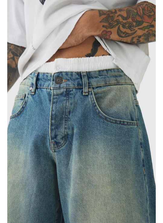 Екстремальні мішкуваті жорсткі тоновані джинси