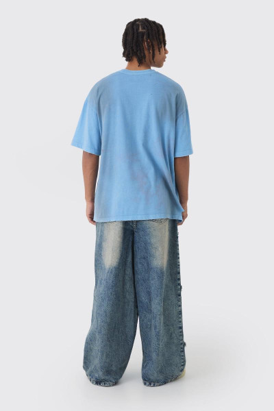 Широкі жорсткі зірчасті джинси з аплікаціями