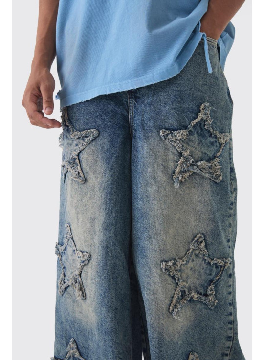 Широкі жорсткі зірчасті джинси з аплікаціями