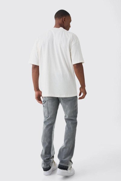 Тонкі, жорсткі столярні джинси з розкльошеними бризками фарби