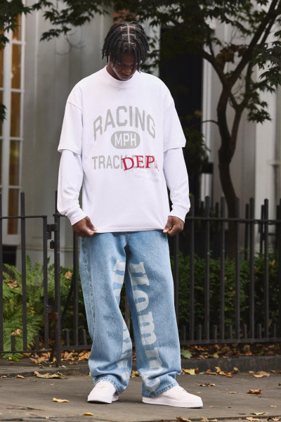 Мішкуваті жорсткі джинси Homme з лазерним принтом