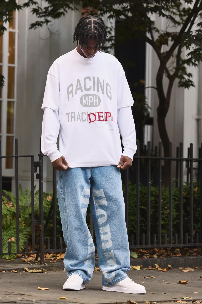 Мішкуваті жорсткі джинси Homme з лазерним принтом