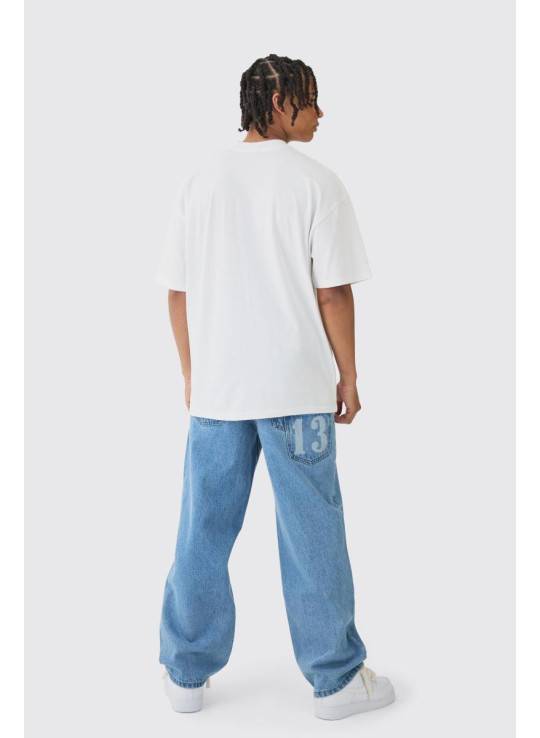 Мішкуваті жорсткі джинси Homme з лазерним принтом