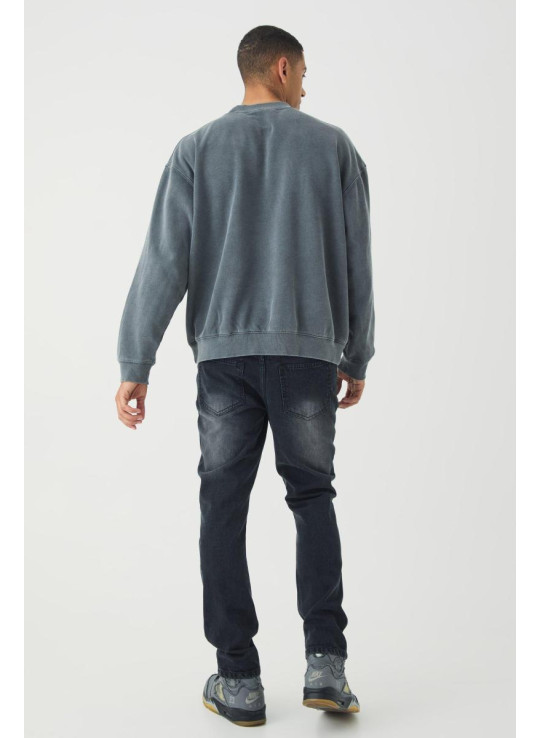 Тонкі рвані джинси з пофарбованими плямами