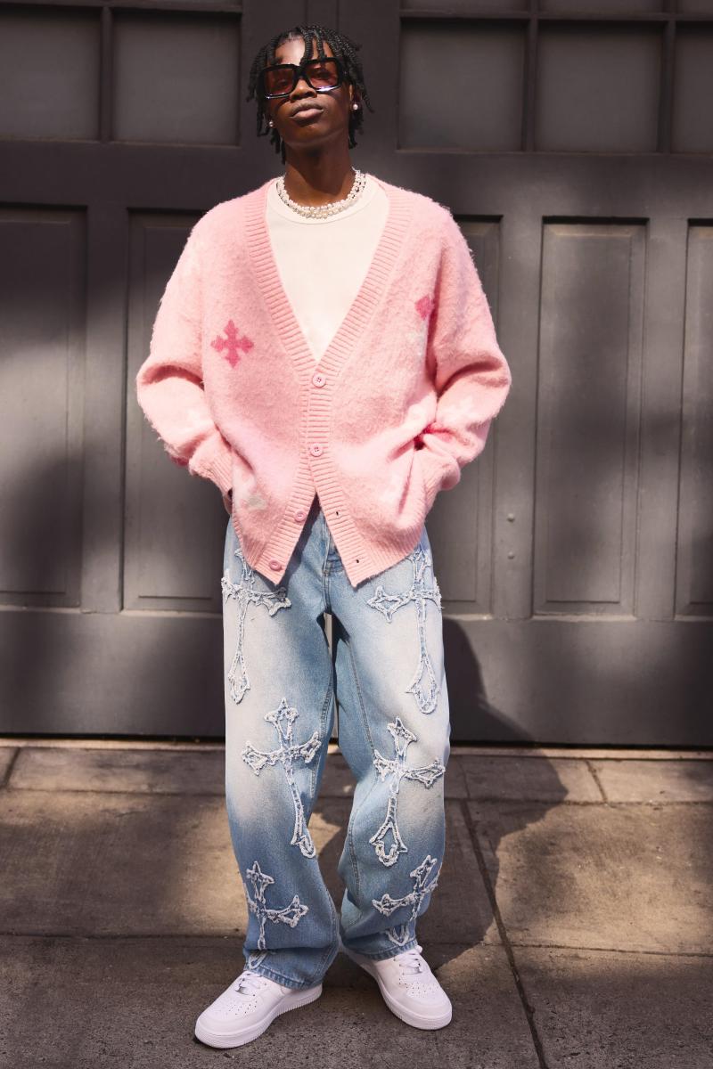 Мішкуваті світло-блакитні джинси з жорсткою хрестовою аплікацією