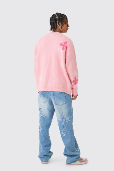 Мішкуваті світло-блакитні джинси з жорсткою хрестовою аплікацією