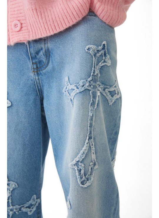 Мішкуваті світло-блакитні джинси з жорсткою хрестовою аплікацією