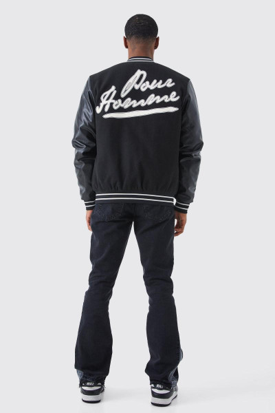 Тонкі жорсткі розкльошені контрастні рвані джинси з ластовицею